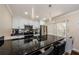 Stylish kitchen featuring granite counters, stainless appliances, and ample cabinet space at 2706 11Th Ct, Palm Harbor, FL 34684