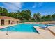 Beautiful community pool for residents with convenient access to changing rooms and restrooms at 2706 11Th Ct, Palm Harbor, FL 34684