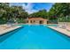 The community pool offers a tranquil and private swimming experience for all residents at 2706 11Th Ct, Palm Harbor, FL 34684
