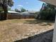 An expansive backyard with a wood fence and plenty of space at 3008 E 38Th Ave, Tampa, FL 33610
