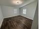Bright bedroom with wood flooring and ample natural light at 3008 E 38Th Ave, Tampa, FL 33610