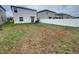 Backyard with lawn and privacy fence at 3810 Romano Busciglio St, Tampa, FL 33619
