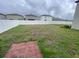 Backyard with a brick patio at 3810 Romano Busciglio St, Tampa, FL 33619
