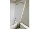 Bathroom showing a tile shower and tub combination and white tiled walls at 3810 Romano Busciglio St, Tampa, FL 33619