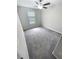 Comfortable bedroom with neutral walls, carpeted floors, a ceiling fan, and a window at 3810 Romano Busciglio St, Tampa, FL 33619
