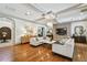 Open living room with hardwood floors, coffered ceilings, and sophisticated decor at 4313 W Beachway Dr, Tampa, FL 33609