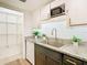 Updated kitchen with pantry, sleek granite countertops, and stainless steel appliances at 4405 Vieux Carre Cir # 4405, Tampa, FL 33613