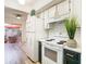 Updated kitchen with access to a delightful outdoor space, stainless steel appliances, and granite countertops at 4405 Vieux Carre Cir # 4405, Tampa, FL 33613