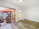 Living room features modern floors, neutral paint, and access to a cozy outdoor space at 4405 Vieux Carre Cir # 4405, Tampa, FL 33613