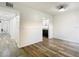 Bright living room featuring wood-look floors and fresh, neutral paint palette at 4405 Vieux Carre Cir # 4405, Tampa, FL 33613