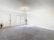 Bright living room with gray carpet, fresh white walls, and natural light at 4405 Vieux Carre Cir # 4405, Tampa, FL 33613