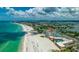 A breathtaking aerial view of the beach front location at 4950 Gulf Blvd # 409, St Pete Beach, Fl, FL 33706
