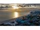 Aerial view of beachfront condos with sandy beach and ocean views at 4950 Gulf Blvd # 409, St Pete Beach, Fl, FL 33706