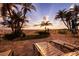 Inviting patio area with sun loungers, offering tranquil views and perfect for relaxation at 4950 Gulf Blvd # 409, St Pete Beach, Fl, FL 33706