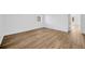 Spacious bedroom with new flooring, natural light, and ample space at 5526 Southernview Dr, Zephyrhills, FL 33541