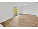 Spacious living area with large windows and modern flooring at 5526 Southernview Dr, Zephyrhills, FL 33541