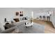 Cozy living room with a sofa, chairs, rug, and modern decor at 5526 Southernview Dr, Zephyrhills, FL 33541