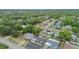Neighborhood aerial featuring tree-lined streets and a view of surrounding houses at 601 Patricia Ave, Dunedin, FL 34698