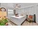 Spacious bedroom with large bed and decorative accents at 601 Patricia Ave, Dunedin, FL 34698