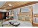 Serene bedroom with a wood ceiling, plush bed, and stylish decor at 601 Patricia Ave, Dunedin, FL 34698