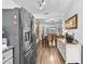 Bright and modern kitchen featuring stainless steel appliances and stylish cabinetry at 601 Patricia Ave, Dunedin, FL 34698
