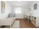 Cozy bedroom with hardwood floors, neutral paint and trim, plus lots of room for sewing at 6015 19Th N St # 311, St Petersburg, FL 33714