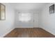 Bright empty bedroom with hardwood floors, neutral paint and trim at 6015 19Th N St # 311, St Petersburg, FL 33714