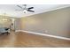 Modern dining room features hardwood floors, ceiling fan, designer lighting, and neutral paint at 6015 19Th N St # 311, St Petersburg, FL 33714