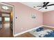 Bright dining room with wood floors, fan, and an open design at 6015 19Th N St # 311, St Petersburg, FL 33714