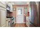 Cozy kitchen showcasing modern appliances, light cabinetry, and open design at 6015 19Th N St # 311, St Petersburg, FL 33714
