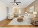 Nicely decorated living room with stylish furniture, hardwood floors, and cozy ambiance at 6015 19Th N St # 311, St Petersburg, FL 33714