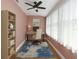Home office with natural light, wood floors, and a spacious work area at 6015 19Th N St # 311, St Petersburg, FL 33714