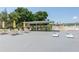 Enjoy the outdoor patio, with tables and chairs, covered area, and cornhole game at 6015 19Th N St # 311, St Petersburg, FL 33714