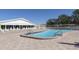 Enjoy this sparkling outdoor pool with brick pavers and sun loungers, perfect for relaxation and recreation at 6015 19Th N St # 311, St Petersburg, FL 33714