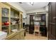 Well-organized home office features a desk, shelving, and storage, creating a productive workspace at 707 24Th Sw St, Largo, FL 33770