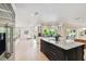 Bright and airy kitchen offers sleek appliances, plenty of natural light, and views into the backyard at 7109 Pelican Island Dr, Tampa, FL 33634