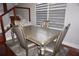 Elegant dining room featuring a modern table, comfortable chairs, and stylish decor at 716 Promenade Pl, Tampa, FL 33602