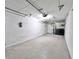 Spacious garage with painted walls and updated flooring at 716 Promenade Pl, Tampa, FL 33602