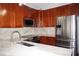 Stylish kitchen showcasing granite countertops, stainless appliances, and modern cabinetry at 716 Promenade Pl, Tampa, FL 33602