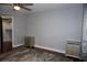 Bright bedroom with hardwood floors and two nightstands at 716 Promenade Pl, Tampa, FL 33602