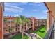 Relaxing balcony view overlooking the courtyard, featuring green space and comfortable outdoor seating at 8931 Blind Pass Rd # 360, St Pete Beach, FL 33706