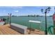 Waterfront dock with a cleaning station and panoramic water views at 8931 Blind Pass Rd # 360, St Pete Beach, FL 33706