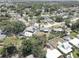 Expansive aerial view of a residential neighborhood with tree-lined streets and diverse home styles at 9240 53Rd N Way, Pinellas Park, FL 33782