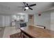 Kitchen and dining area with island, granite countertops, modern appliances, and ample cabinet space at 9240 53Rd N Way, Pinellas Park, FL 33782