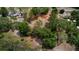 Aerial view of property with a mix of trees and open space close to neighborhood at 10040 Lake Dr, Weeki Wachee, FL 34613