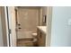 Bathroom boasts modern fixtures, including a shower-tub combo and stylish vanity at 10040 Lake Dr, Weeki Wachee, FL 34613