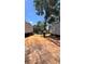 View of two homes in progress on a lot with a ladder resting on the ground at 10040 Lake Dr, Weeki Wachee, FL 34613
