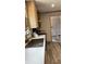 Kitchen features stainless steel sink and modern appliances at 10040 Lake Dr, Weeki Wachee, FL 34613