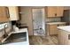 Kitchen features stainless steel sink and modern appliances at 10040 Lake Dr, Weeki Wachee, FL 34613