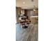 Eat-in kitchen has modern appliances, a breakfast table, and center island at 10040 Lake Dr, Weeki Wachee, FL 34613